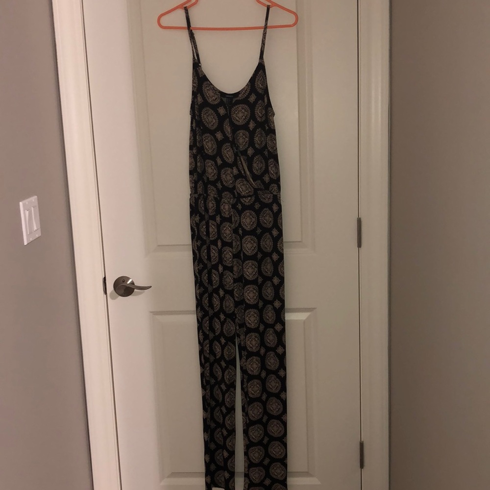 Brand new spaghetti strap jumpsuit w/pockets